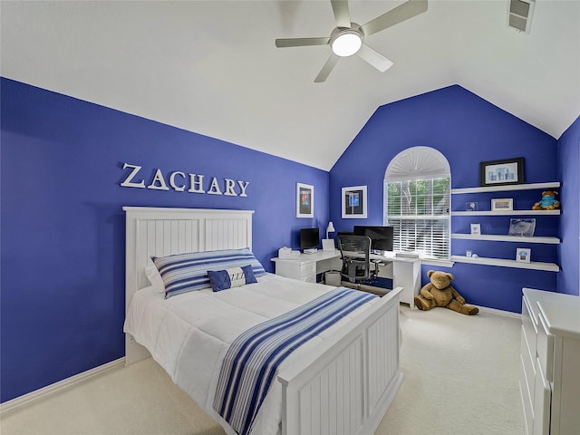 bedroom featuring ceiling fan, light colored carpet, and lofted ceiling