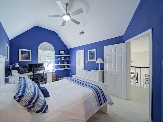 bedroom featuring ceiling fan, light carpet, and vaulted ceiling