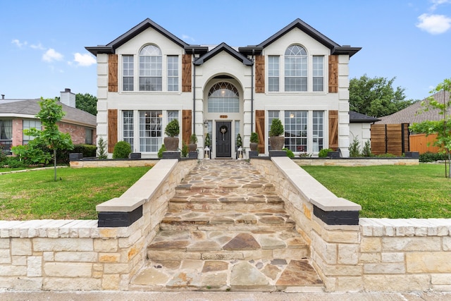 view of front of home featuring a front yard