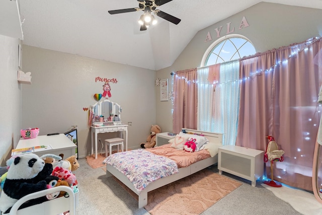 carpeted bedroom featuring ceiling fan and lofted ceiling