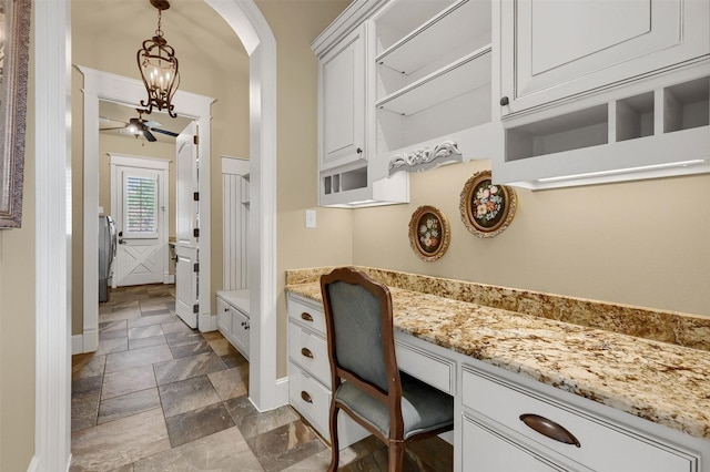 bathroom featuring washer / dryer