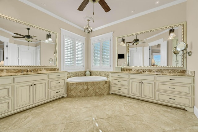 bathroom with tiled bath, vanity, and ornamental molding