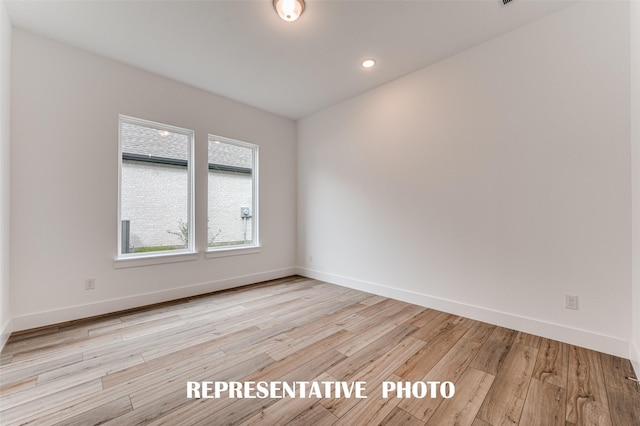 empty room featuring light wood-type flooring