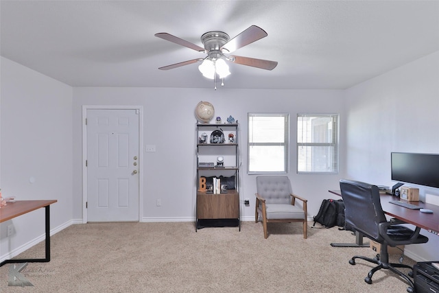 office area with ceiling fan and light colored carpet