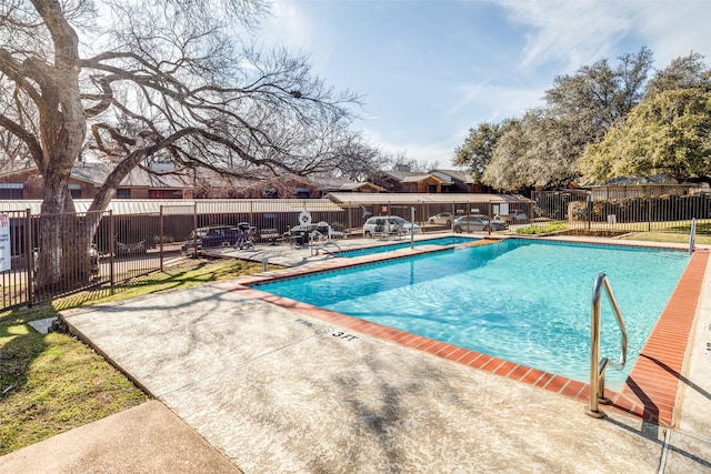 view of pool featuring a patio area