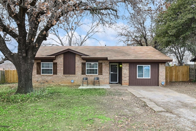 ranch-style home with a front yard