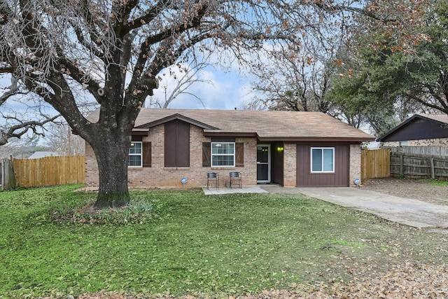 ranch-style house with a front lawn