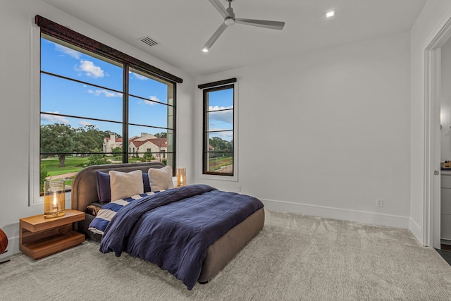 carpeted bedroom with ceiling fan