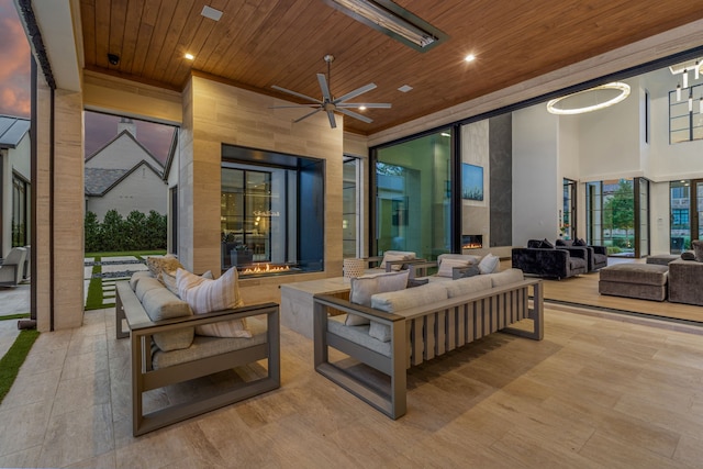 view of patio / terrace with ceiling fan and outdoor lounge area