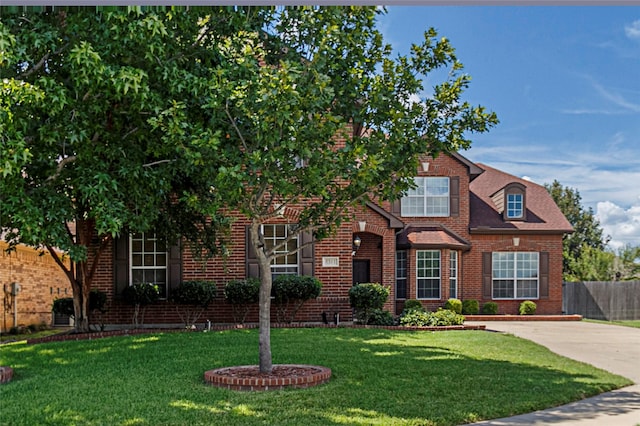 view of front of home with a front lawn