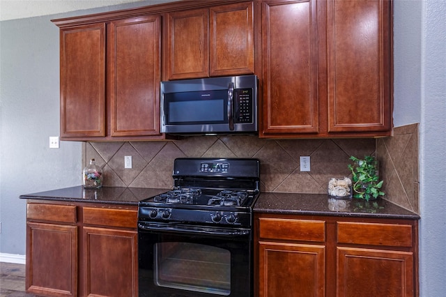 kitchen with gas stove and backsplash