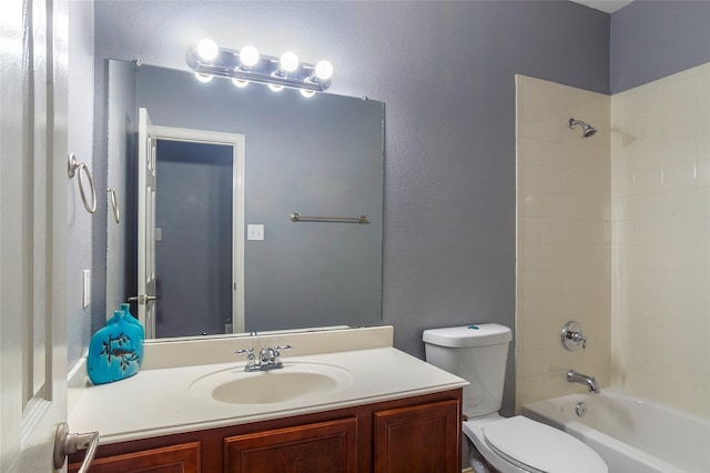 full bathroom featuring toilet, vanity, and bathing tub / shower combination