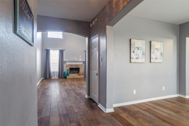 hallway featuring dark hardwood / wood-style floors