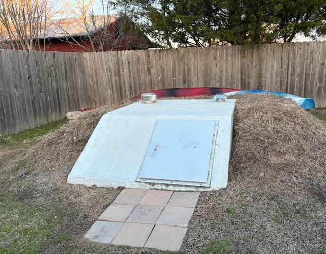 view of entry to storm shelter