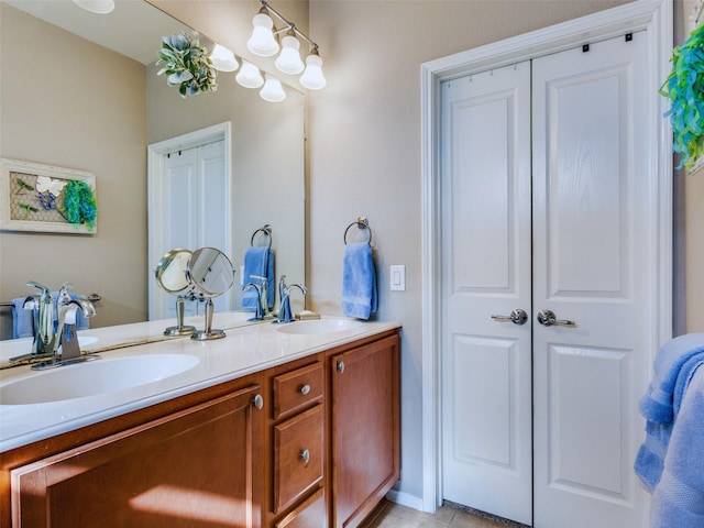 bathroom with vanity and tile patterned floors