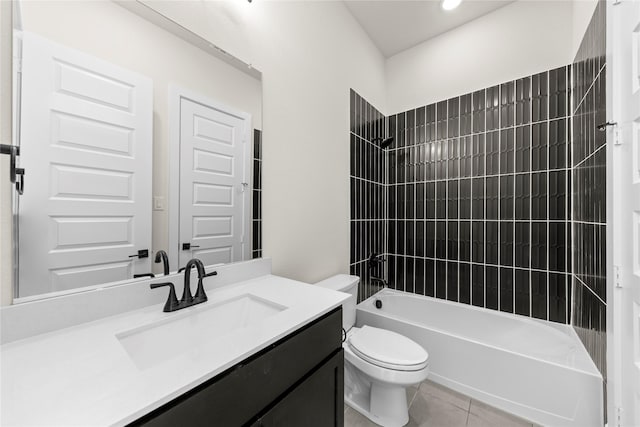 bathroom with toilet, tile patterned flooring, tub / shower combination, and vanity