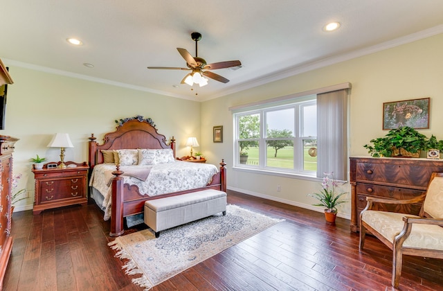 bedroom with ceiling fan, dark hardwood / wood-style flooring, and crown molding