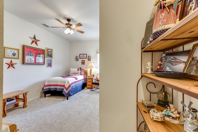 carpeted bedroom with ceiling fan