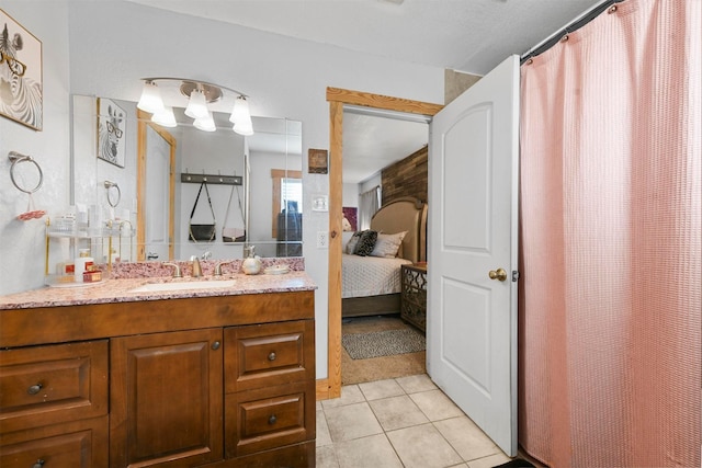 bathroom featuring vanity and tile patterned flooring