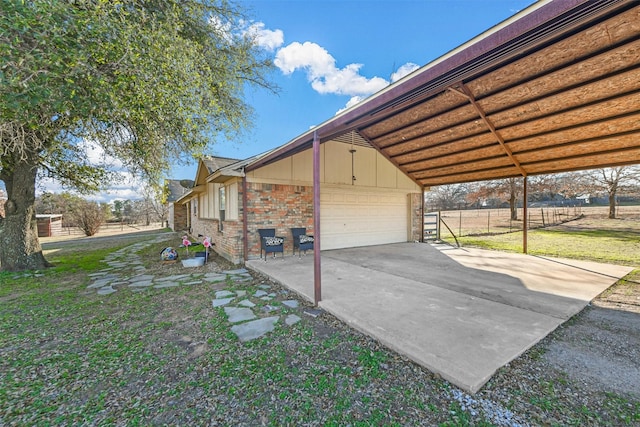 view of side of home featuring a lawn