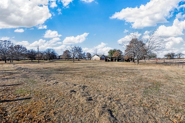 view of yard featuring a rural view