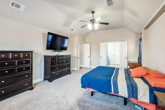 carpeted bedroom featuring ceiling fan and lofted ceiling