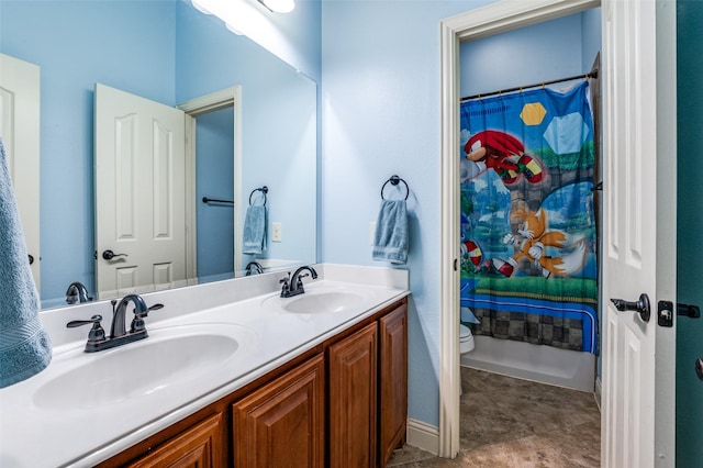 bathroom with toilet and vanity