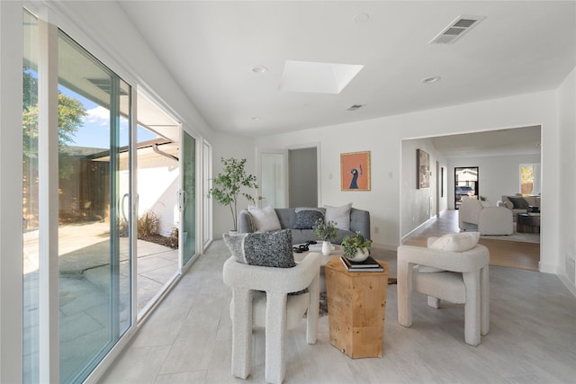 living room with a skylight