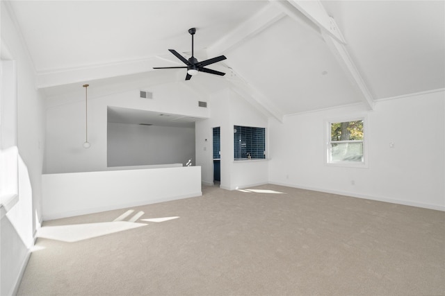 unfurnished living room with ceiling fan, carpet floors, beam ceiling, and high vaulted ceiling