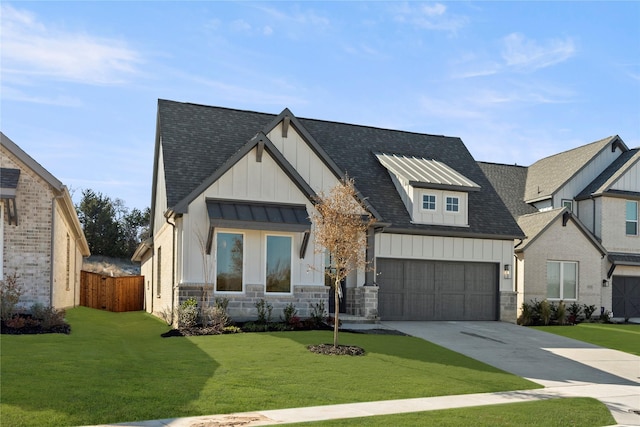 view of front of property with a garage and a front yard