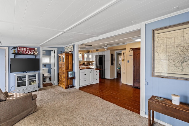 living room with dark hardwood / wood-style flooring