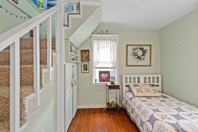 bedroom with hardwood / wood-style floors