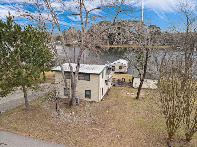 exterior space with a water view