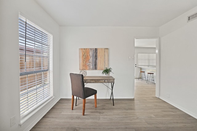 home office featuring light hardwood / wood-style flooring