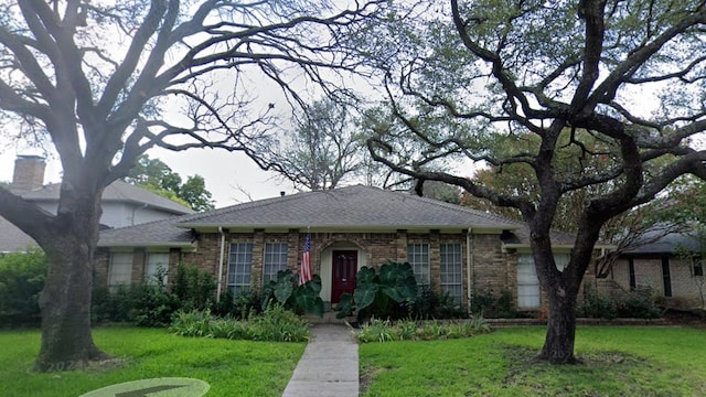 view of front of house with a front yard