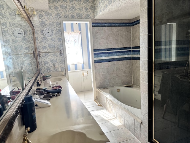 bathroom featuring vanity, tile patterned flooring, and plus walk in shower