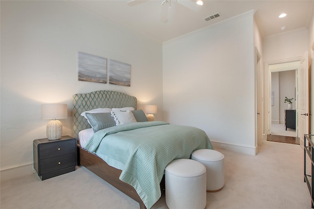 carpeted bedroom featuring baseboards, visible vents, recessed lighting, ceiling fan, and crown molding