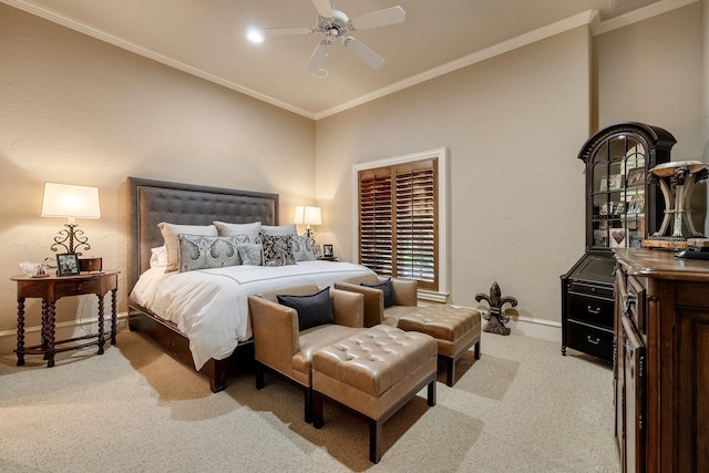 carpeted bedroom featuring crown molding and ceiling fan