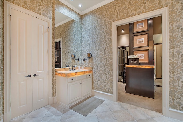 bathroom featuring ornamental molding, tile patterned flooring, and wallpapered walls