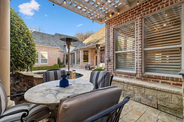 view of patio / terrace featuring a pergola