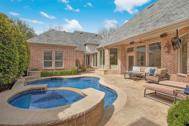 view of pool featuring an in ground hot tub, outdoor lounge area, and a patio