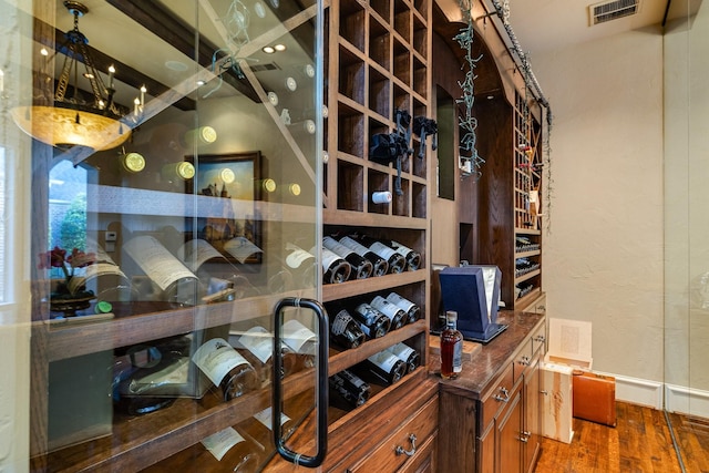 wine room featuring hardwood / wood-style flooring