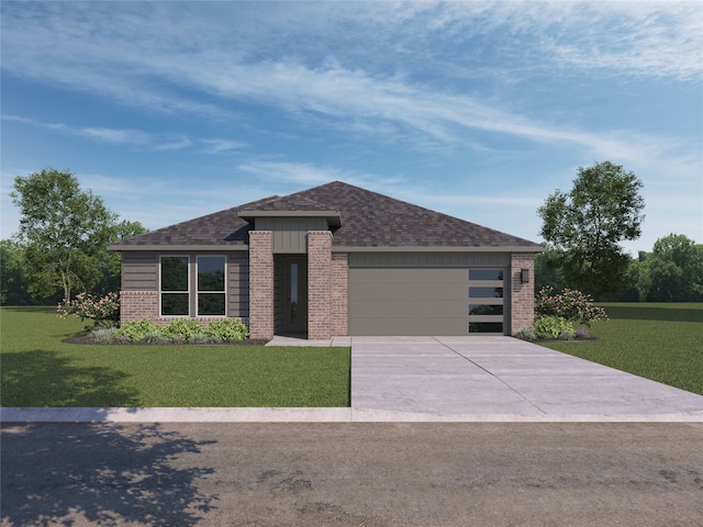 view of front of home featuring a garage and a front lawn