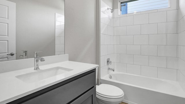 full bathroom with toilet, vanity, and bathing tub / shower combination