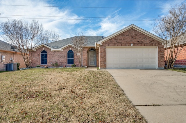 ranch-style home with a front yard, a garage, and central air condition unit