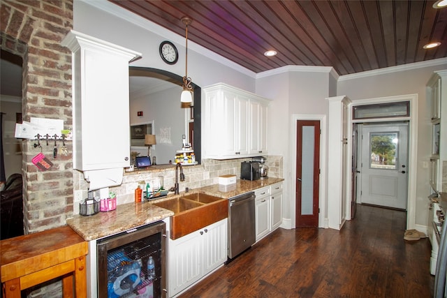 kitchen featuring wine cooler, tasteful backsplash, dishwasher, hanging light fixtures, and white cabinets