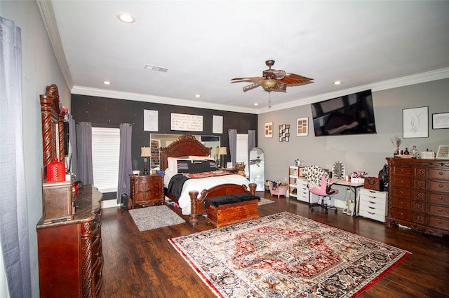 bedroom featuring ceiling fan, dark hardwood / wood-style flooring, and ornamental molding