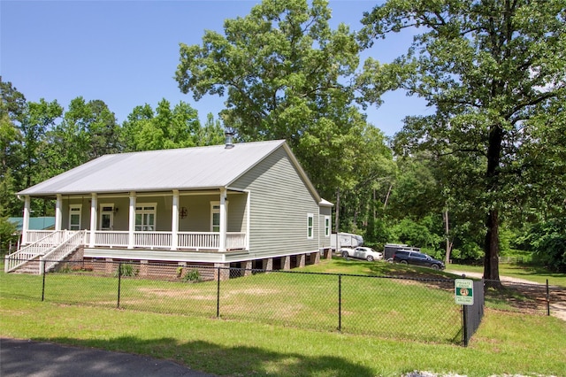 4201 Linda Ln, Shreveport, LA 71107 - view of front of property with gravel driveway, covered porch, and a fenced front yard