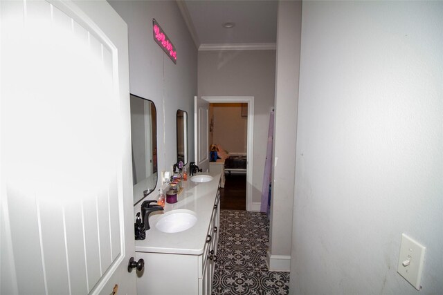4201 Linda Ln, Shreveport, LA 71107 - corridor featuring a sink, dark tile patterned floors, and ornamental molding