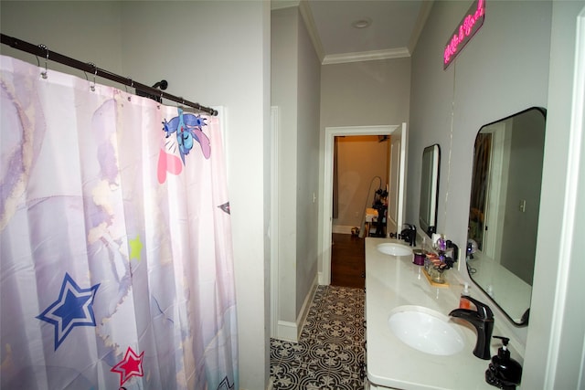 bathroom featuring vanity, tile patterned floors, and crown molding